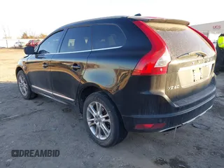 2014 Volvo XC60 3.2L z VIN YV4952DLXE2502676, wystawiony jako IAAI lot #41382804 z przebiegiem 206 805 mil mil oraz . Historia ofert i sprzedaży dostępna na DreamBid. Obrazek 3.