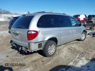 2001 Chrysler Town & Country with VIN 2C8GP44301R304800, listed as a IAAI auction lot 41433836 with Not Provided miles and . Bid and sale history available at DreamBid. Image 4.
