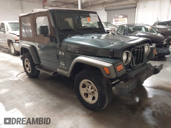 2003 Jeep Wrangler X z VIN 1J4FA39S43P339234, wystawiony jako IAAI lot #41329654 z przebiegiem 175 376 mil mil oraz . Historia ofert i sprzedaży dostępna na DreamBid. Obrazek 1.