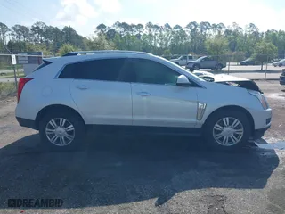 2013 Cadillac SRX Luxury Collection with VIN 3GYFNCE33DS608040, listed as a IAAI auction lot 41912860 with 128,295 mi miles. Bid and sale history available at carsss.com. Image 13.