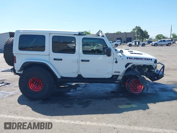 2018 Jeep Wrangler Unlimited Rubicon with VIN 1C4HJXFGXJW110629, listed as a IAAI auction lot 42141572 with 65,973 mi miles and . Bid and sale history available at DreamBid. Image 13.