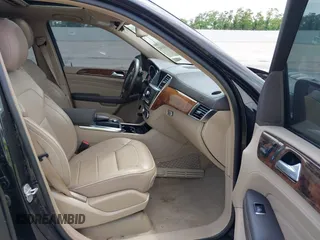2014 Mercedes-Benz M with VIN 4JGDA7DBXEA291980, listed as a IAAI auction lot 42161942 with 121,341 mi miles. Bid and sale history available at carsss.com. Image 5.