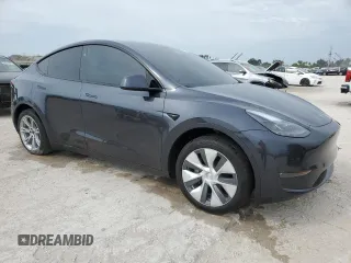 2024 Tesla Model Y Long Range with VIN 7SAYGDEE3RA253354, listed as a Copart auction lot 50524105 with 10,353 mi miles and Salvage Title. Bid and sale history available at DreamBid. Image 4.