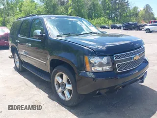 2012 Chevrolet Tahoe LTZ with VIN 1GNSKCE07CR327306, listed as a IAAI auction lot 41992514 with 213,617 mi miles and . Bid and sale history available at DreamBid. Image 1.