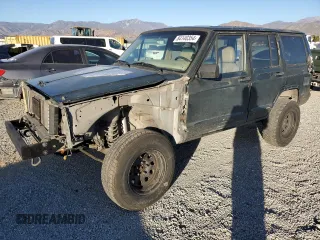 1996 Jeep Cherokee z VIN 1J4FT78S0TL231381, wystawiony jako Copart lot #84140354 z przebiegiem 220 660 mil mil oraz Szkoda całkowita • Salvage title. Historia ofert i sprzedaży dostępna na DreamBid. Obrazek 1.