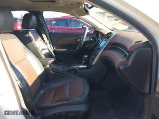 2014 Chevrolet Malibu LTZ with VIN 1G11J5SX0EF289841, listed as a IAAI auction lot 41669908 with 233,599 mi miles. Bid and sale history available at carsss.com. Image 5.