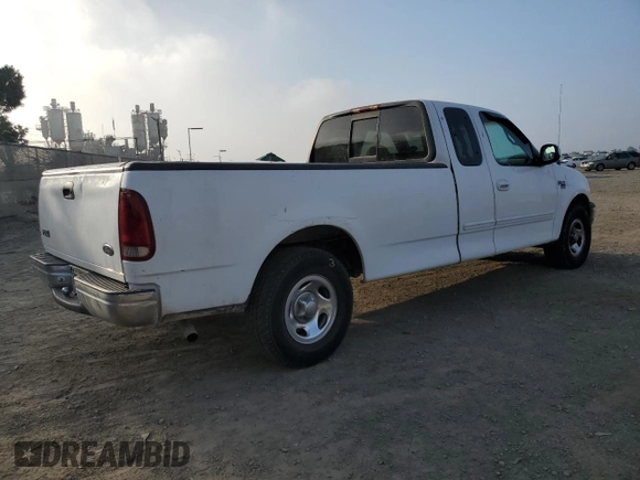 1999 Ford F-150 XL with VIN 1FTRX17L6XNA06844, listed as a Copart auction lot 83109004 with Not Provided miles and Salvage Title. Bid and sale history available at carsss.com. Image 3.