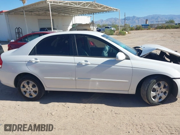 2009 Kia Spectra EX with VIN KNAFE222695588022, listed as a IAAI auction lot 42106609 with 153,688 mi miles. Bid and sale history available at carsss.com. Image 13.