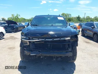 2021 Chevrolet Tahoe Premier with VIN 1GNSKSKDXMR195984, listed as a IAAI auction lot 42528305 with 89,925 mi miles and . Bid and sale history available at DreamBid. Image 13.