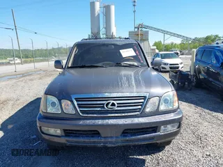 2003 Lexus LX with VIN JTJHT00W233532297, listed as a IAAI auction lot 42189676 with 235,992 mi miles. Bid and sale history available at carsss.com. Image 12.