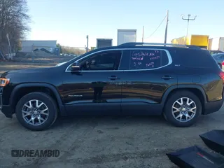 2021 GMC Acadia SLT z VIN 1GKKNULS6MZ128487, wystawiony jako IAAI lot #41918386 z przebiegiem 57 426 mil mil oraz . Historia ofert i sprzedaży dostępna na DreamBid. Obrazek 14.