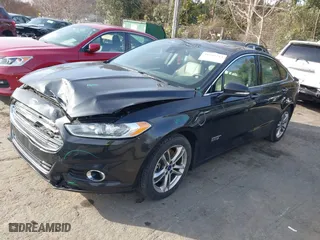 2015 Ford Fusion Energi Titanium with VIN 3FA6P0SU8FR189159, listed as a IAAI auction lot 41595744 with 170,558 mi miles. Bid and sale history available at carsss.com. Image 17.