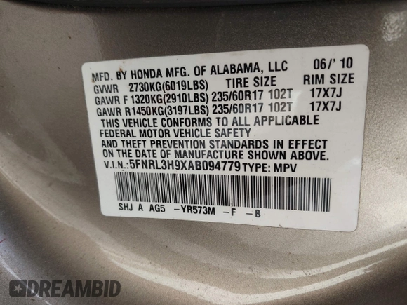 2010 Honda Odyssey Touring with VIN 5FNRL3H9XAB094779, listed as a IAAI auction lot 40412812 with 145,533 mi miles. Bid and sale history available at carsss.com. Image 9.