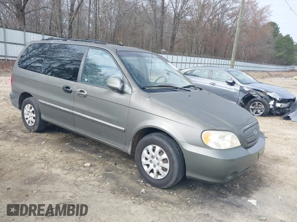 2004 Kia Sedona LX with VIN KNDUP131546543841, listed as a IAAI auction lot 41541012 with 112,122 mi miles. Bid and sale history available at carsss.com. Image 1.
