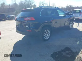 2015 Jeep Cherokee Latitude with VIN 1C4PJMCB3FW652553, listed as a IAAI auction lot 41881238 with 161,944 mi miles and . Bid and sale history available at DreamBid. Image 4.