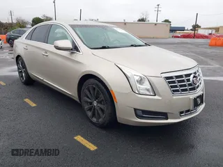 2013 Cadillac XTS with VIN 2G61N5S32D9127146, listed as a IAAI auction lot 41578528 with 98,529 mi miles. Bid and sale history available at carsss.com. Image 1.