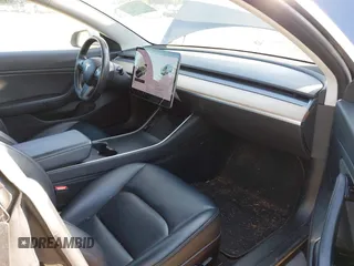 2018 Tesla Model 3 Long Range Battery with VIN 5YJ3E1EA1JF021139, listed as a IAAI auction lot 42116626 with 83,003 mi miles and . Bid and sale history available at DreamBid. Image 5.
