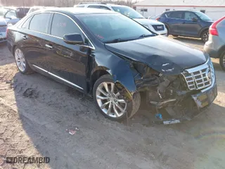 2015 Cadillac XTS Luxury with VIN 2G61N5S34F9226182, listed as a IAAI auction lot 41554394 with 119,194 mi miles. Bid and sale history available at carsss.com. Image 1.