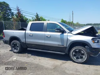 2019 Ram 1500 Rebel with VIN 1C6SRFLT8KN797618, listed as a IAAI auction lot 42556663 with 92,606 mi miles and . Bid and sale history available at DreamBid. Image 13.