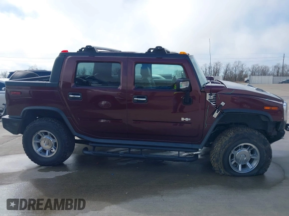 2006 Hummer H2 with VIN 5GRGN22U66H104237, listed as a IAAI auction lot 41665284 with 61,984 mi miles. Bid and sale history available at carsss.com. Image 13.