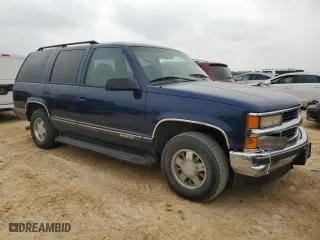1996 Chevrolet Tahoe Limited with VIN 1GNEC13R3TJ330329, listed as a Copart auction lot 50984595 with 363,240 mi miles and Salvage Title. Bid and sale history available at carsss.com. Image 4.