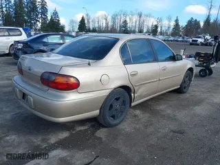 2003 Chevrolet Malibu LS with VIN 1G1NE52J63M721617, listed as a IAAI auction lot 41732035 with 109,318 mi miles. Bid and sale history available at carsss.com. Image 4.