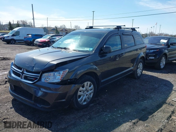 2018 Dodge Journey SE with VIN 3C4PDCAB3JT506088, listed as a IAAI auction lot 41969875 with 47,567 mi miles and . Bid and sale history available at carsss.com. Image 2.