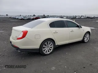 2014 Lincoln MKS EcoBoost с VIN 1LNHL9FT7EG601089, выставлен на аукционе Copart как лот 49483605 с пробегом 121 709 миль миль и Списание • Salvage title. История ставок и продаж доступна на DreamBid. Изображение 3.