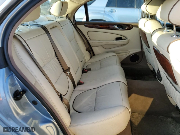 2005 Jaguar XJ VDP with VIN SAJWA82C65SG45247, listed as a Copart auction lot 77950594 with NaN miles and Salvage Title. Bid and sale history available at carsss.com. Image 10.