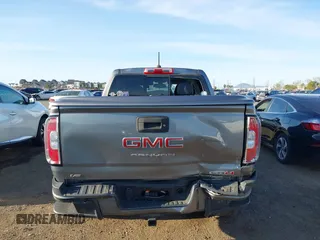 2021 GMC Canyon 4WD AT4 w/Leather with VIN 1GTG6FEN9M1123638, listed as a IAAI auction lot 41852163 with 77,442 mi miles. Bid and sale history available at carsss.com. Image 16.