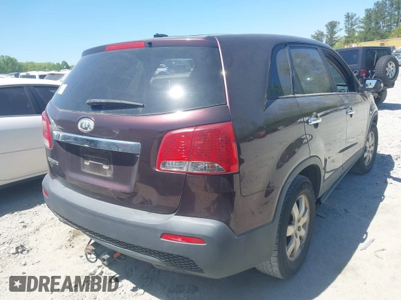 2011 Kia Sorento LX with VIN 5XYKT3A13BG084952, listed as a IAAI auction lot 42061498 with 284,445 mi miles. Bid and sale history available at carsss.com. Image 4.