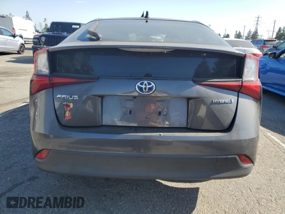 2020 Toyota Prius L Eco z VIN JTDKARFU0L3124101, wystawiony jako Copart lot #54017505 z przebiegiem 94 072 mil mil oraz Szkoda całkowita • Salvage title. Historia ofert i sprzedaży dostępna na DreamBid. Obrazek 6.