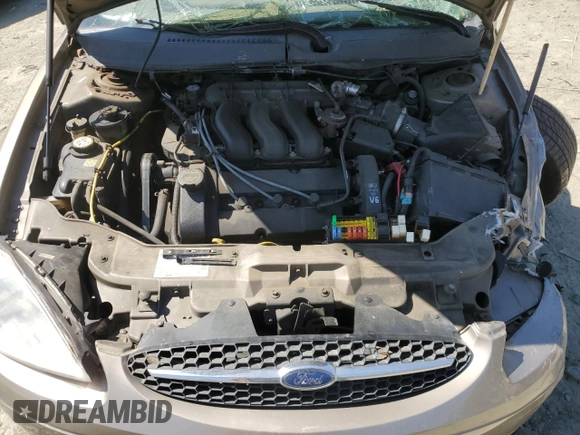2003 Ford Taurus SEL Deluxe with VIN 1FAHP56SX3G199970, listed as a Copart auction lot 53042795 with 212,802 mi miles and Salvage Title. Bid and sale history available at DreamBid. Image 12.