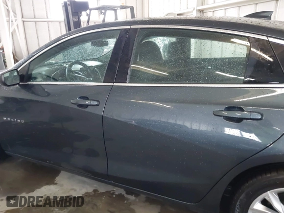 2020 Chevrolet Malibu LT with VIN 1G1ZD5STXLF052438, listed as a IAAI auction lot 42006000 with 140,513 mi miles and . Bid and sale history available at DreamBid. Image 14.
