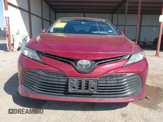 2019 Toyota Camry LE with VIN 4T1B11HK4KU725075, listed as a IAAI auction lot 41781275 with 156,856 mi miles and . Bid and sale history available at DreamBid. Image 12.