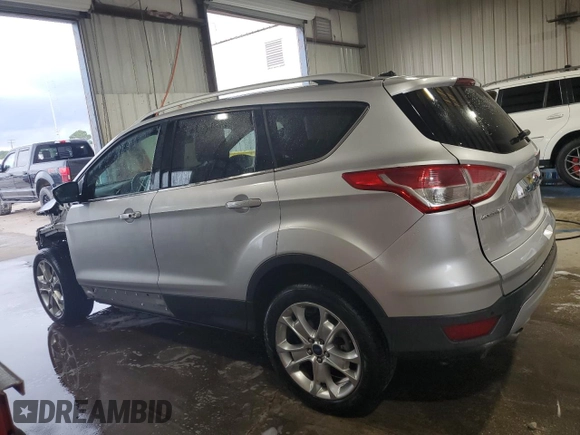 2014 Ford Escape Titanium с VIN 1FMCU0J98EUA35069, выставлен на аукционе Copart как лот 58369635 с пробегом 92 323 миль миль и Списание • Salvage title. История ставок и продаж доступна на DreamBid. Изображение 2.