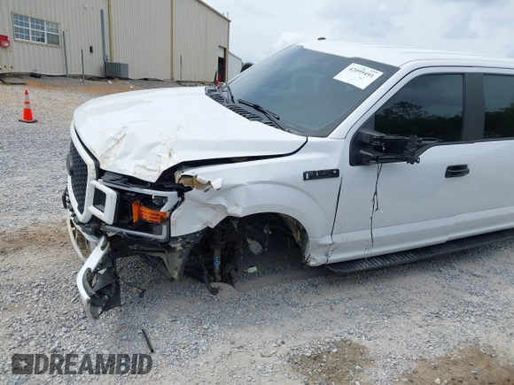 2018 Ford F-150 XL z VIN 1FTFW1E57JKF55049, wystawiony jako IAAI lot #42099491 z przebiegiem 159 170 mil mil oraz . Historia ofert i sprzedaży dostępna na DreamBid. Obrazek 6.