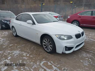 2011 BMW 3 Series 335i xDrive with VIN WBAKF9C54BE619741, listed as a IAAI auction lot 41561412 with 118,813 mi miles. Bid and sale history available at carsss.com. Image 1.