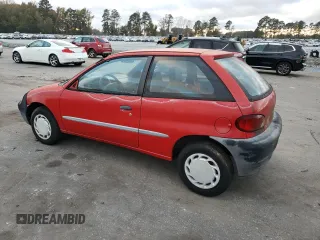 2001 Suzuki Swift GA z VIN 2S2AB21H216604405, wystawiony jako Copart lot #80427254 z przebiegiem 63 703 mil mil oraz Tytuł czysty. Historia ofert i sprzedaży dostępna na DreamBid. Obrazek 2.