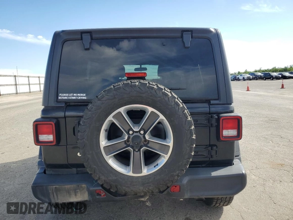 2019 Jeep Wrangler Unlimited Sahara z VIN 1C4HJXEN0KW588687, wystawiony jako Copart lot #52812895 z przebiegiem 91 486 mil mil oraz Szkoda całkowita • Salvage title. Historia ofert i sprzedaży dostępna na DreamBid. Obrazek 6.