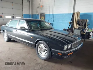 1997 Jaguar XJ Vanden Plas with VIN SAJKX6243VC800080, listed as a IAAI auction lot 42190859 with 192,979 mi miles and . Bid and sale history available at DreamBid. Image 1.