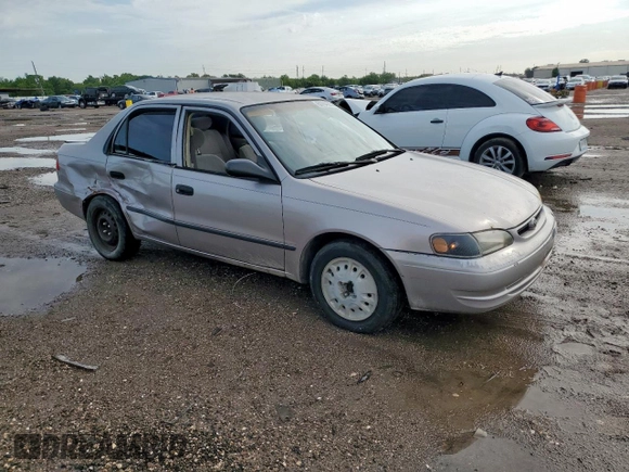 1999 Toyota Corolla VE z VIN 1NXBR12E0XZ215258, wystawiony jako Copart lot #60704095 z przebiegiem Nie podano mil oraz Szkoda całkowita • Salvage title. Historia ofert i sprzedaży dostępna na DreamBid. Obrazek 4.
