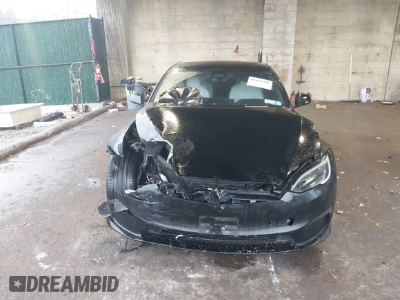 2022 Tesla Model S Plaid with VIN 5YJSA1E64NF477855, listed as a IAAI auction lot 41470591 with Not provided miles and . Bid and sale history available at DreamBid. Image 12.