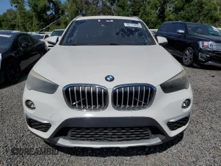 2018 BMW X1 sDrive28i with VIN WBXHU7C32J5L07666, listed as a Copart auction lot 54173465 with 132,514 mi miles and Clean Title. Bid and sale history available at DreamBid. Image 5.