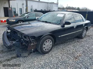 2006 Mercury Grand Marquis GS with VIN 2MEFM74W26X632447, listed as a IAAI auction lot 41564231 with 131,563 mi miles. Bid and sale history available at carsss.com. Image 2.