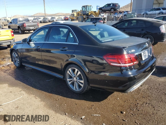 2015 Mercedes-Benz E 350 Luxury with VIN WDDHF8JBXFB097002, listed as a Copart auction lot 82178534 with 161,315 mi miles and Salvage title. Bid and sale history available at DreamBid. Image 2.