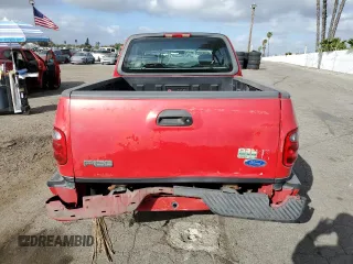 2003 Ford F-150 XL with VIN 1FTRX07213KB93777, listed as a Copart auction lot 46950285 with 176,332 mi miles and Salvage title. Bid and sale history available at DreamBid. Image 6.