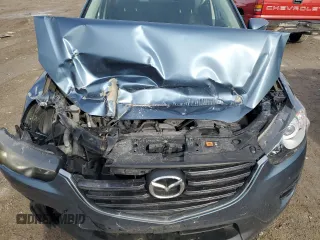 2016 Mazda CX-5 Sport with VIN JM3KE2BY0G0703866, listed as a Copart auction lot 43708185 with 186,790 mi miles and Salvage Title. Bid and sale history available at carsss.com. Image 14.