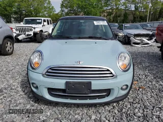 2013 MINI Hardtop z VIN WMWSU3C52DT680586, wystawiony jako Copart lot #59021355 z przebiegiem 208 323 mil mil oraz Czysty tytuł • Clean title. Historia ofert i sprzedaży dostępna na DreamBid. Obrazek 5.