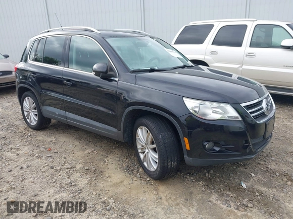 2011 Volkswagen Tiguan SEL with VIN WVGBV7AX6BW521525, listed as a IAAI auction lot 42490216 with 123,546 mi miles and . Bid and sale history available at DreamBid. Image 1.